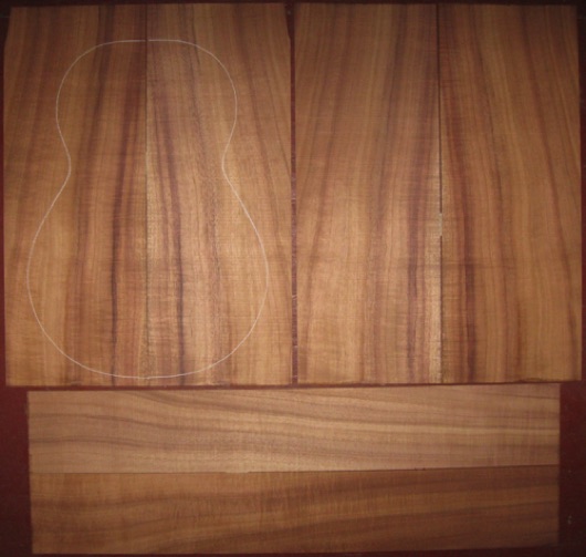 Koa Baritone/Tenor Ukulele AAA  $150
(4) top-back plates 6" x 16-1/4"
(2) side plates 3-1/2" x 23"
Air dried since 2016; tight fiddleback curl, bright colors, straight-vertical grain.
set #170-2391