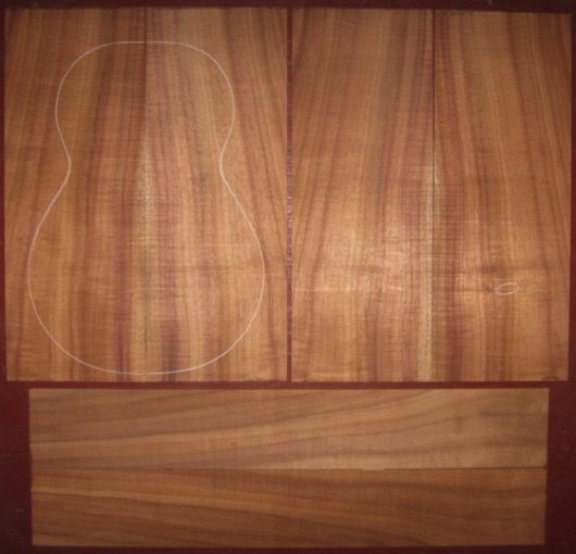 Koa Baritone/Tenor Ukulele AAA  $150
(4) top-back plates 6" x 16-1/4"
(2) side plates 3-1/2" x 23"
Air dried since 2017, baritone pattern shown, med. curl, bright colors, straight-vertical grain.
set #170-2392
