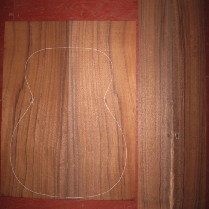 Koa OM/CL AA $120
(2) back plates 9" x 23-1/2"
(2) side plates 4-1/2" x 31"
Air dried since 2010, 15-1/4" OM pattern shown; a couple tight knots blems (circled); dense, straight-grain, dark and stripey.
set #196-1487 Koa OM/CL AA $120
(2) back plates 9" x 23-1/2"
(2) side plates 4-1/2" x 31"
Air dried since 2010, 15-1/4" OM pattern shown; a couple tight knots blems (circled); dense, straight-grain, dark and stripey.
set #196-1487