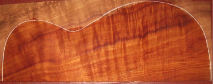 closeup, wetted
set #175-2041
Strong flame on the back plates. Sides matched from same tree with straight grain for easy bending. Two tiny tight knots on sides closeup, wetted
set #175-2041
Strong flame on the back plates. Sides matched from same tree with straight grain for easy bending. Two tiny tight knots on sides