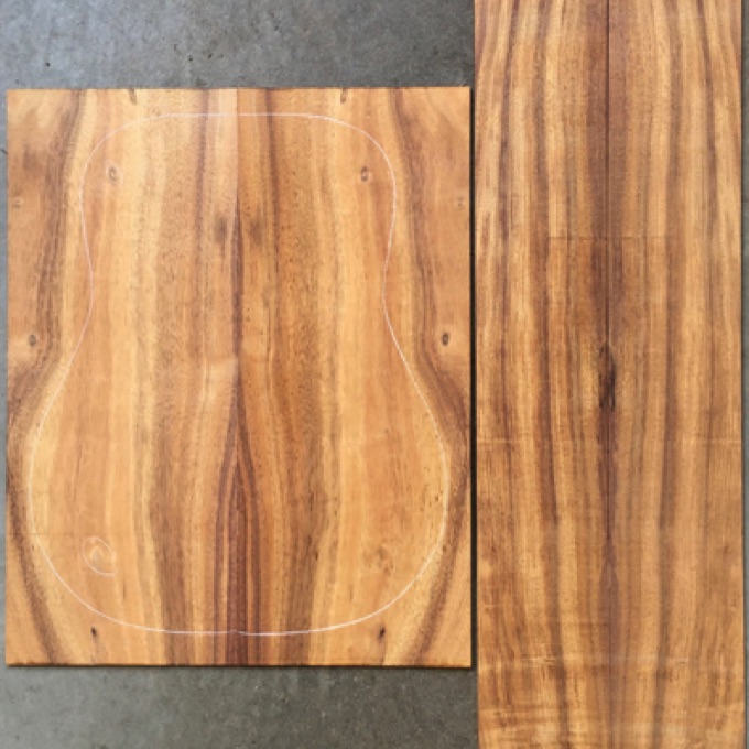 Koa OM/Dreadnought AA  $95
(2) back plates 9" x 22-1/4"
(2) side plates 5" x 35-1/2"
Air dried since 2013, 16" dred pattern shown, bold striping, light curl, whorls at upper and lower bouts.
set #162-2626