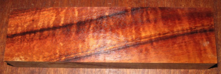 Curly koa knife blank, $17.50 + $4 shipping
7" x 2", sanded 1" thick. Air dried since 2005.  
face #1 (wetted)   -   blank #119-1752